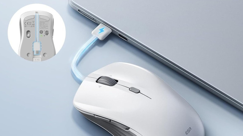 ESR MagMouse being charged with a USB-C cable and a laptop