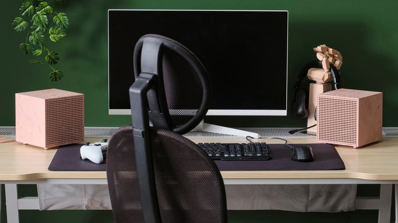 Badkruka IKEA Bluetooth speaker on desk paired in pink.