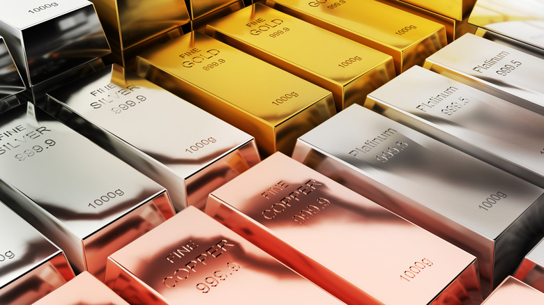 3D render of bars of the precious metals gold, silver, platinum, and palladium
