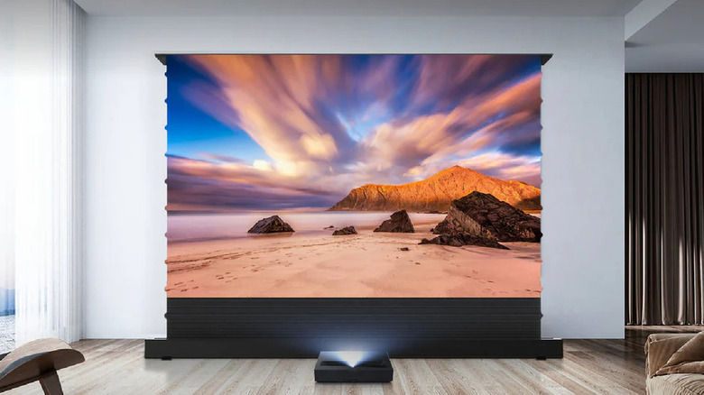 A projector showing a movie on the NothingProjector Motorized Floor Rising 95% ALR Projector Screen