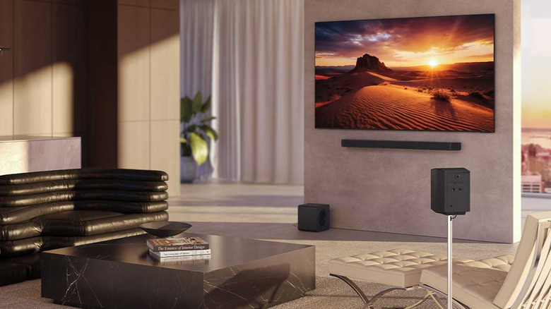 The Samsung HW-Q990H sound system set up in a modern-looking living room