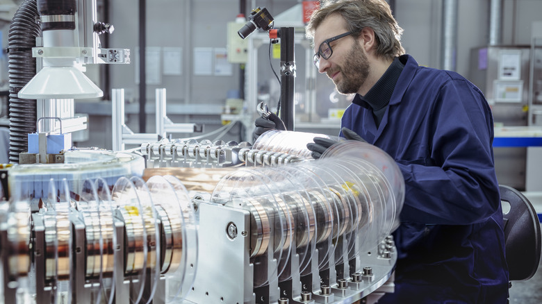 a scientist working on a nuclear reactor
