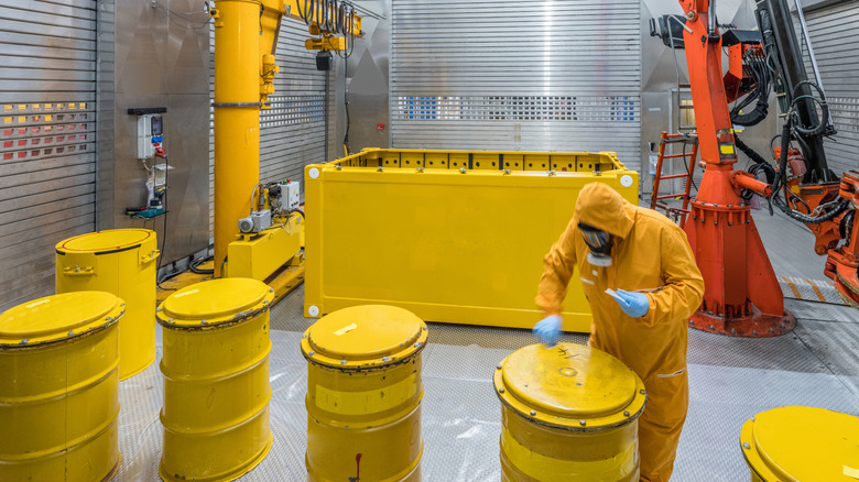 a nuclear waste storage facility with a man in a hazmat suit