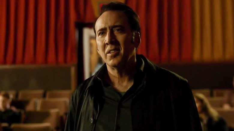 Noah (Nicolas Cage) smiling in "The Humanity Bureau."