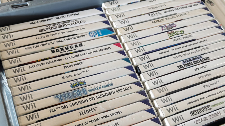a drawer full of Nintendo Wii games