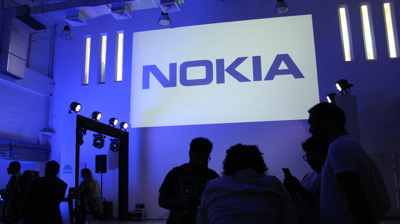 The Nokia logo projected on a wall during a press event