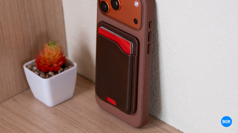 Nomad Leather Mag Wallet on the back of an iPhone