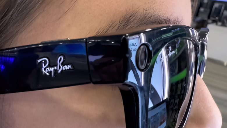 close-up person wearing ray-ban smart glasses