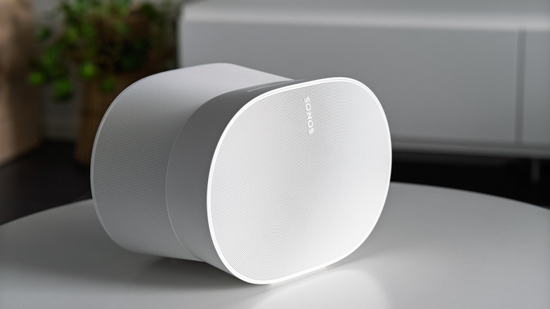 The Sonos Era 300 in white, placed on top of a white table
