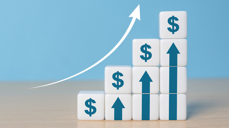 A concept graphic depicting price increases using blocks of increasing height topped with dollar signs.