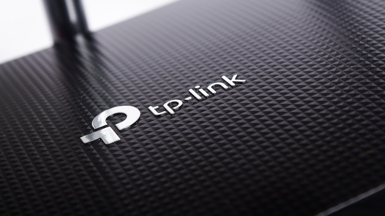 Closeup of the TP-Link logo on a Wi-Fi router