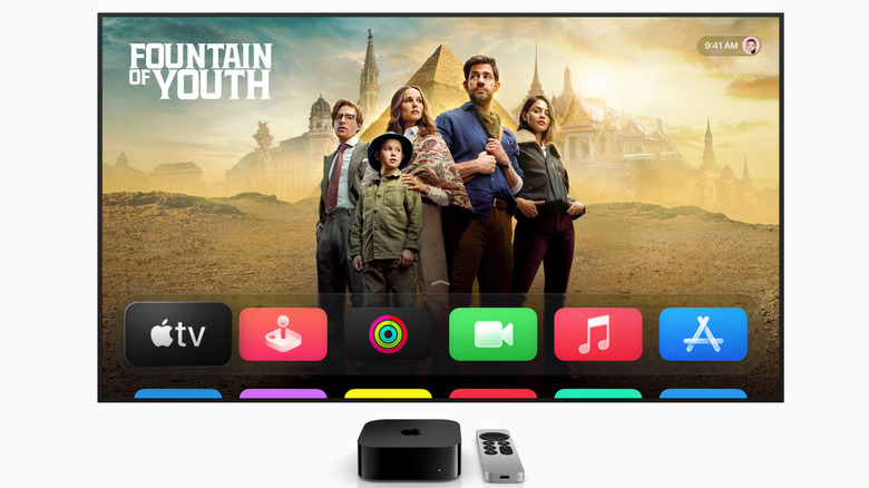 tvOS 26 Liquid Glass on a promo image featuring an Apple TV 4K and a generic TV