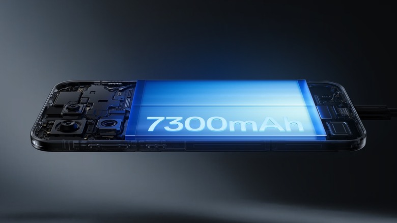 OnePlus 15 with its back removed showing the battery