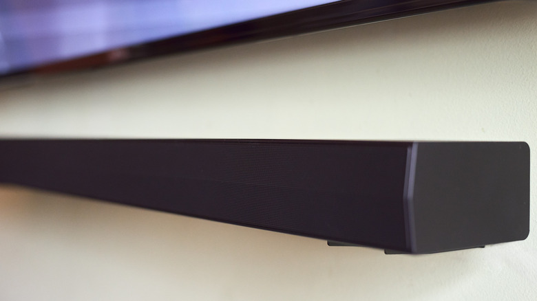 A soundbar mounted under a TV