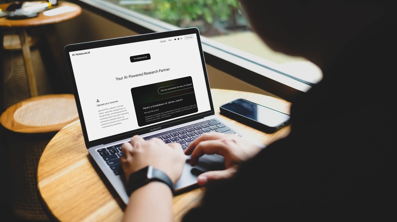 A person using NotebookLM on a computer.