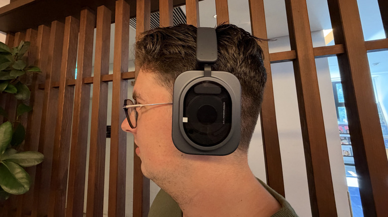 Close-up of a man wearing Nothing Headphone (1) Pro