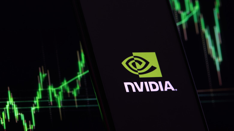 The Nvidia logo displayed on a smartphone in front of a rising stock chart