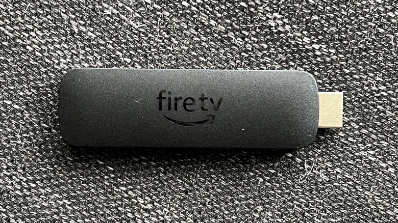 Close-up of Amazon's Fire TV Stick 4K Max on a fabric surface