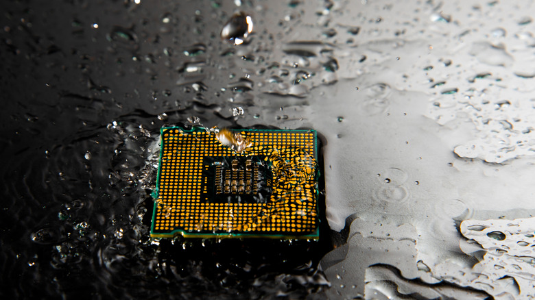 A CPU chip submerged in water