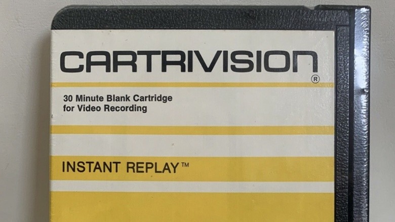A Cartrivision tape labeled "30 Minute Blank Cartridge for Video Recording."