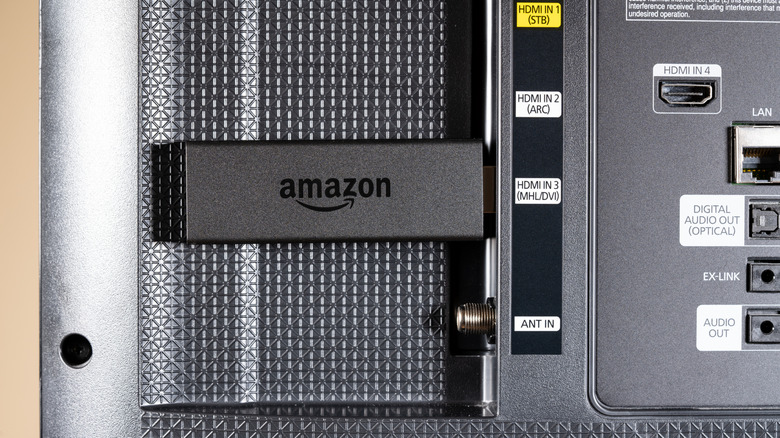 An Amazon Fire TV Stick connected to a TV.