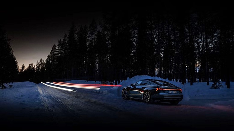 Audi vehicle with new digitized lighting projected in front.