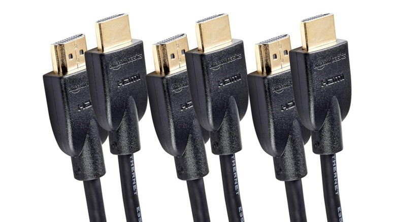 A promotional image for the 3-pack of Amazon Basics HDMI 2.0 cables, the image shows the ends of three cables and shows the Amazon Basics logo