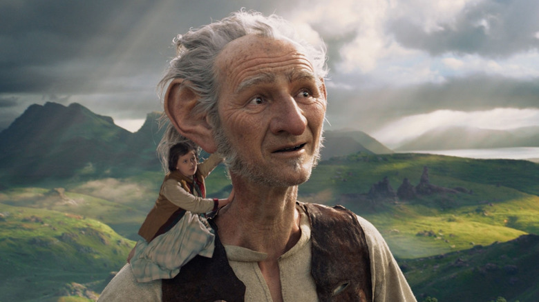 Sophie (Ruby Barnhill) sitting on the Giant's shoulder in 