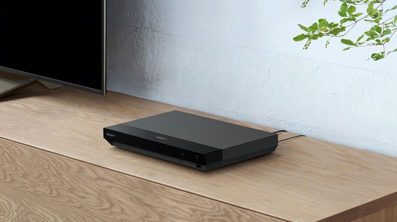 Sony's UBP-X700K 4K Ultra HD Blu-ray player on a TV stand