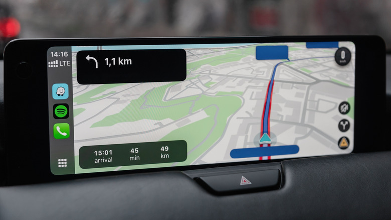 Apple's CarPlay infotainment display showing navigation in a vehicle