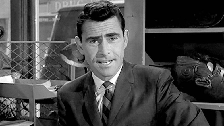 Rod Serling sitting down on 