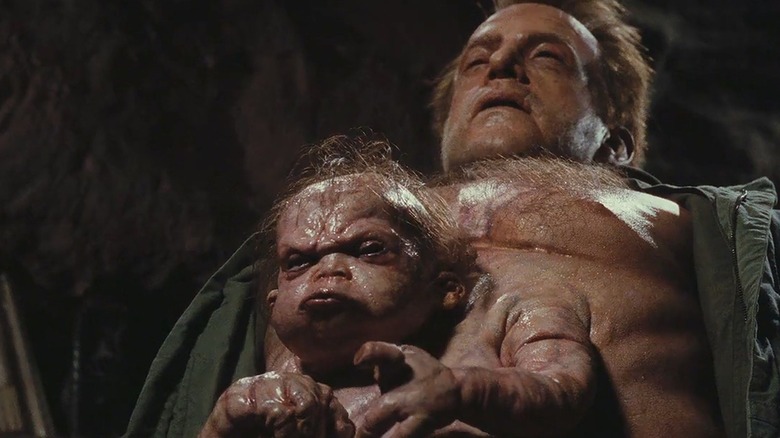 Kuato revealing himself as George's conjoined twin mutant