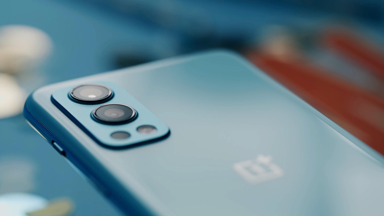 Close-up of OnePlus Nord 2 smartphone with a blurred background