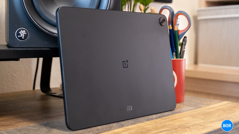 OnePlus Pad Go 2 leaning against a speaker