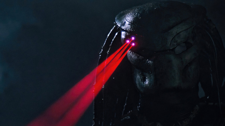 The Predator aims its laser sight