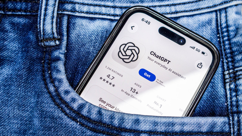 ChatGPT app store page on a smartphone sticking out of jean pocket