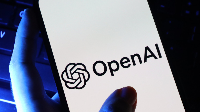 OpenAI logo on a smartphone screen