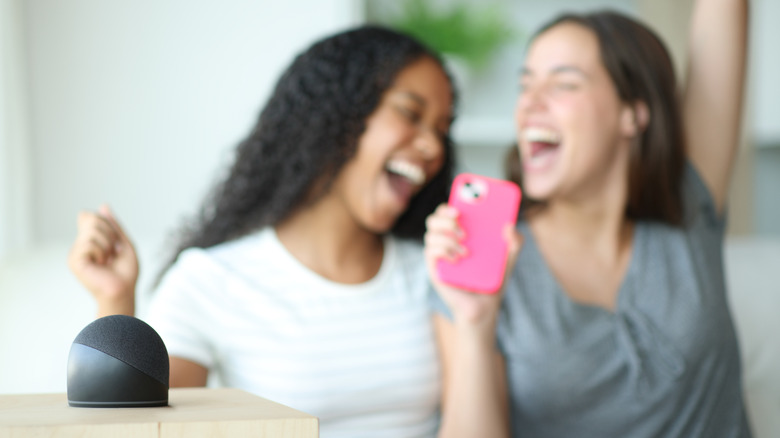 People using a smart speaker