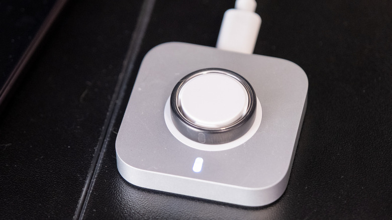 Oura Ring 5 on its charging dock
