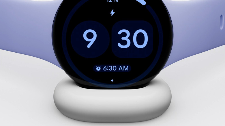 Google Pixel Watch 4 on its side charger