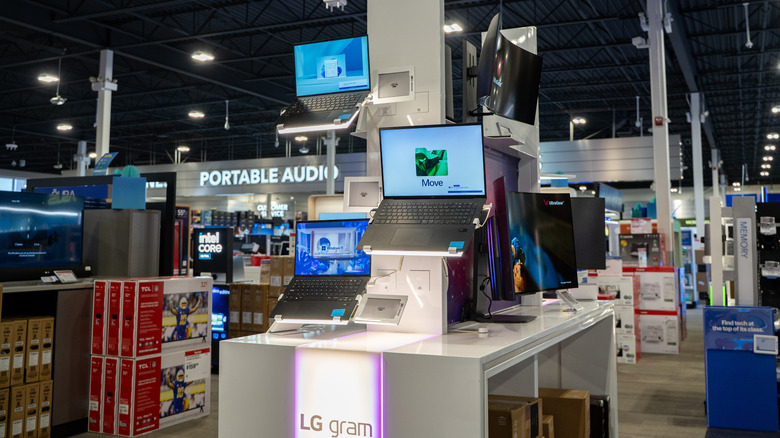 LG Gram laptops on display at an electronics store.