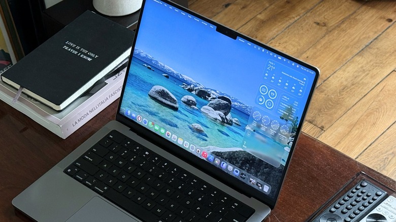 macOS Tahoe new Liquid Glass design running on MacBook Pro
