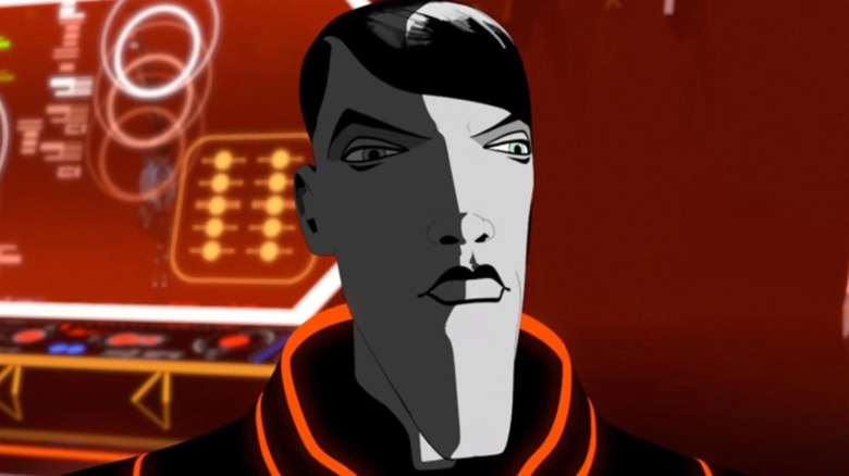 Pavel standing in a red room on "Tron: Uprising."