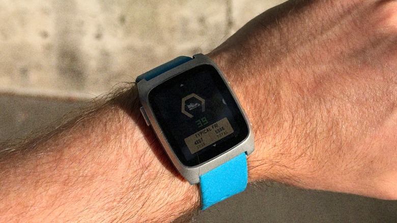 Close-up shot of the Pebble Time 2 display against the sun