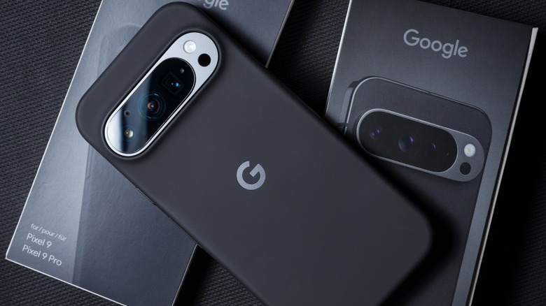 Black colored Google Pixel 9 Pro on a Pixel 9 Pro box.