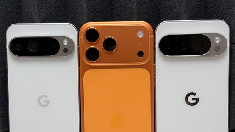 The iPhone 17 Pro flanked by two Pixel phones.