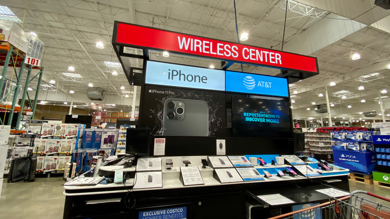 WIRELESS CENTER booth in Costco with various phone plans