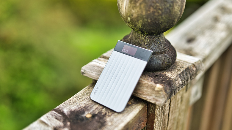 Plaud Note Pro outside on some decking showing the clear display and size