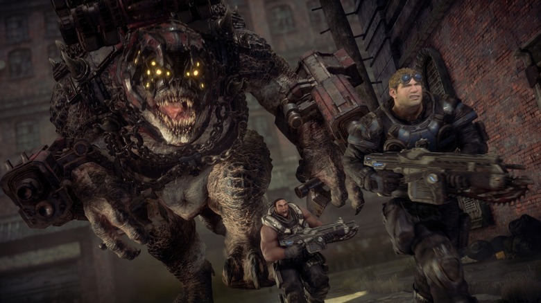 Baird and Cole Train running away from a Brumak in Gears of War Reloaded