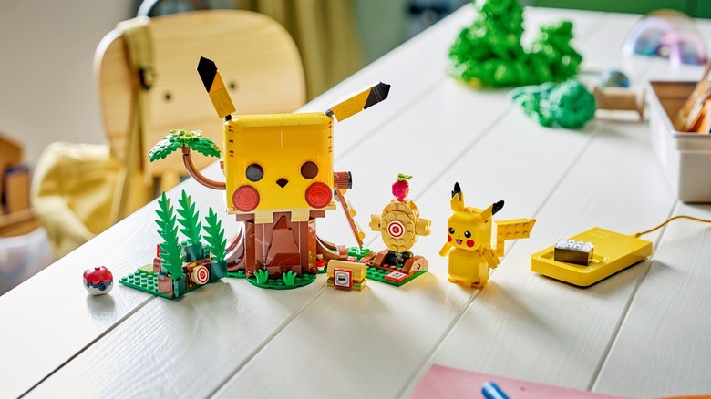 Lego Pokemon Smart Play set featuring Pikachu and a treehouse that looks like Pikachu on a white table